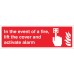 In the event of a Fire - Lift the Cover and Activate Alarm